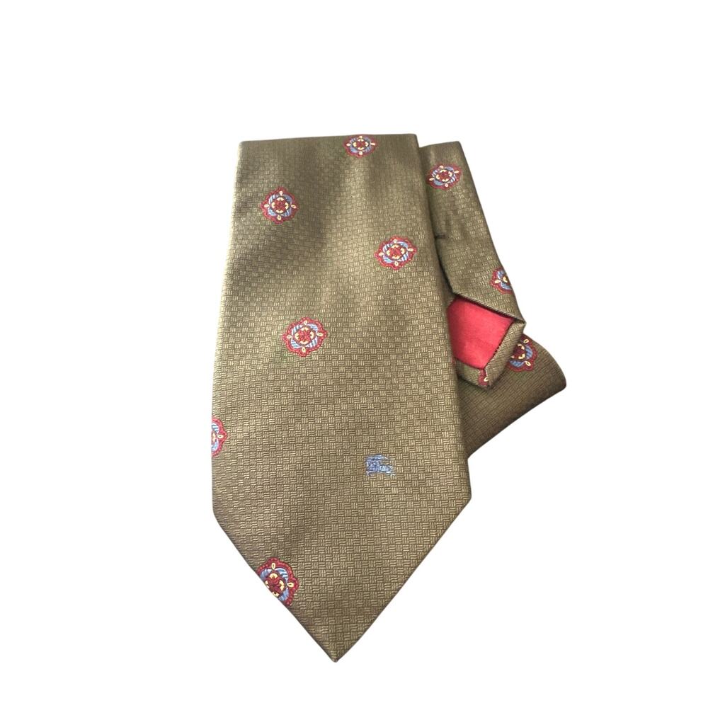 Burberry olive green silk tie featuring a red and blue medallion foulard pattern